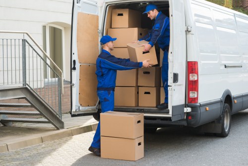 Packing boxes and household items for a move in Shacklewell