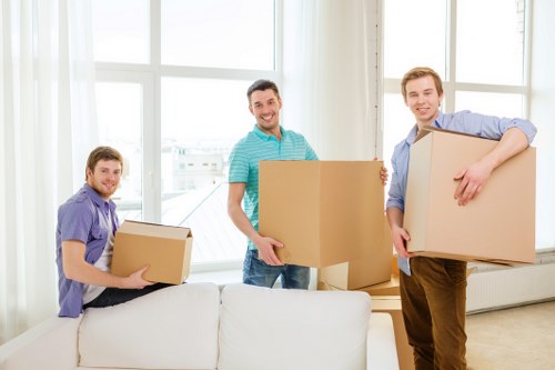 Careful loading of household items for removals in Shacklewell