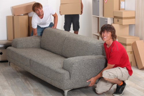 Packing boxes and furniture ready for storage in Shacklewell