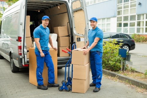 Packed boxes and furniture ready for a Shacklewell property move