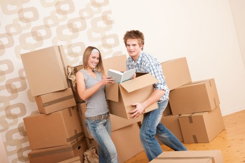 Careful wrapping of fragile belongings during a Shacklewell home move